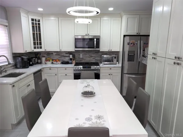 a living room with furniture and windows