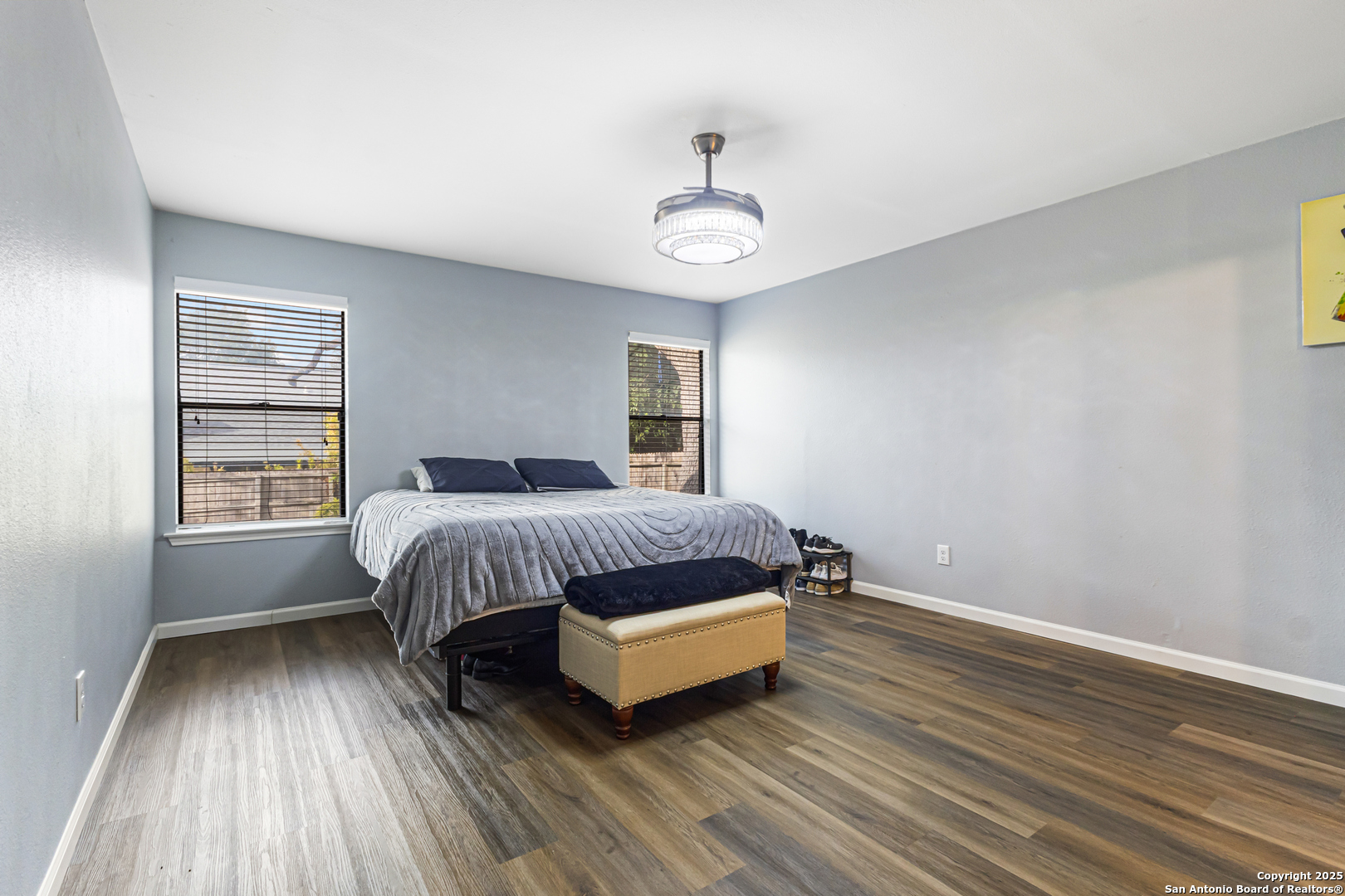 5617 Timber Rain San Antonio, TX 78250 - Photo 16 of 32 a bedroom with a bed and a window