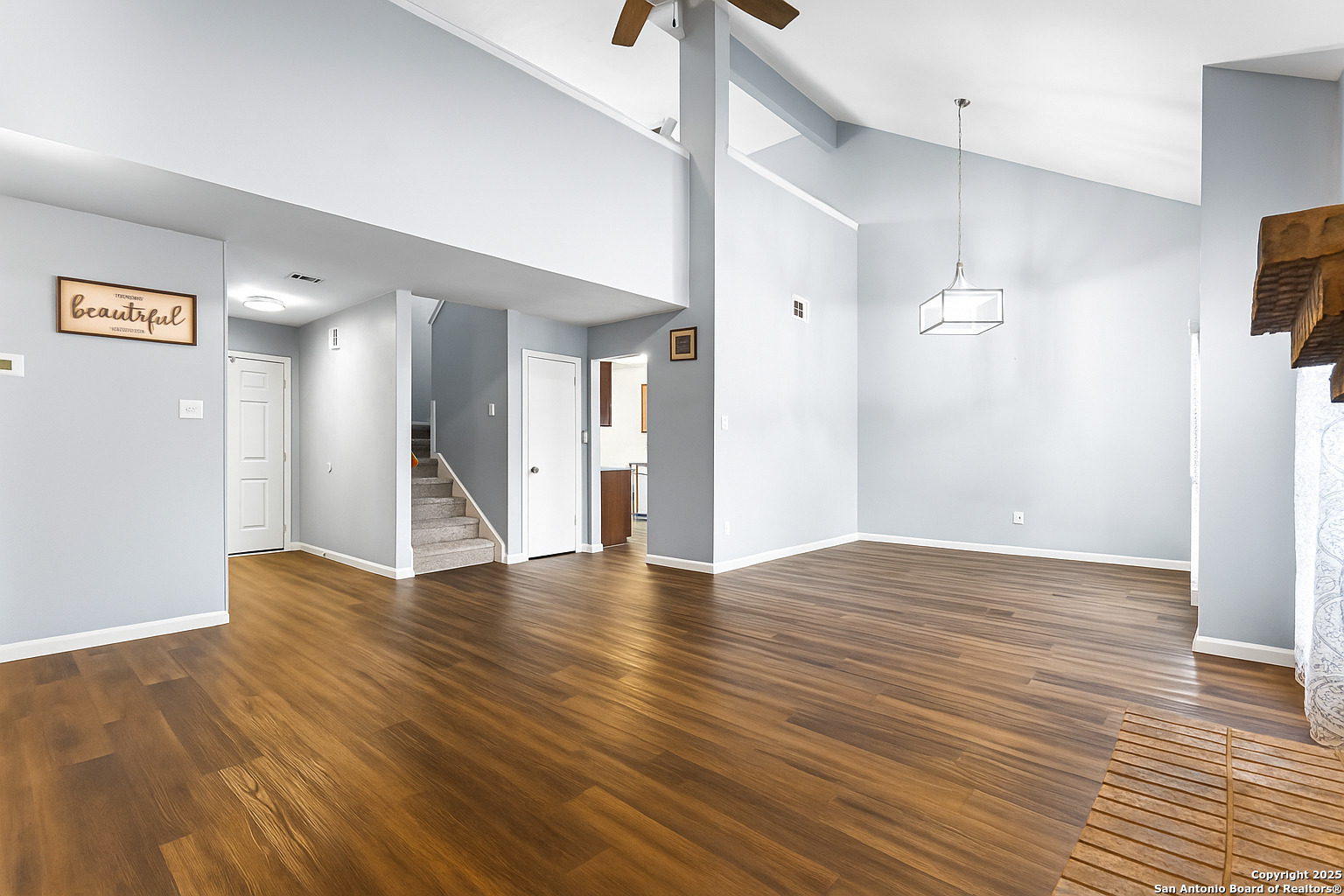 5617 Timber Rain San Antonio, TX 78250 - Photo 8 of 32 a view of an empty room with wooden floor