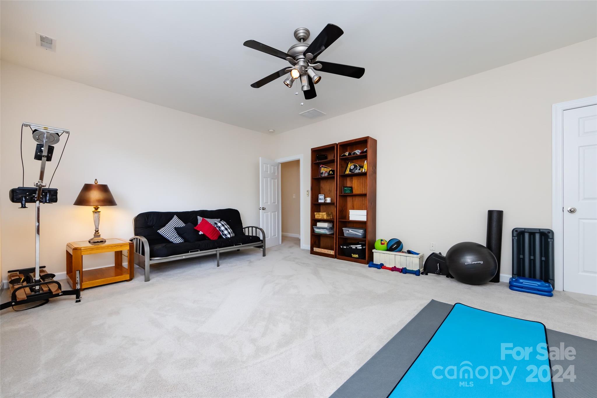 1820 Chestnut Hill Drive Tega Cay, SC 29708 - Photo 34 of 47 a view of a room with gym equipment and a equipment