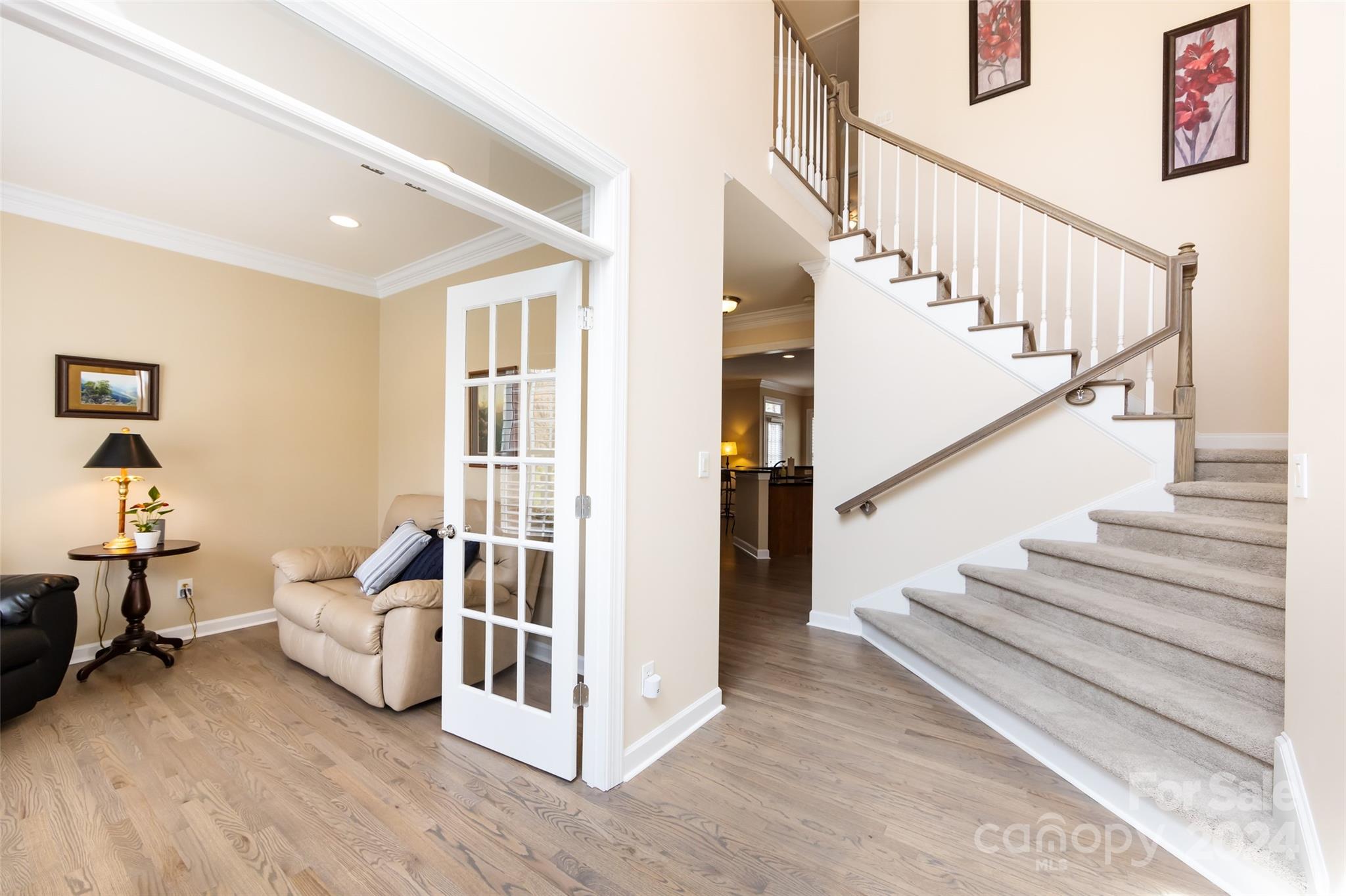 1820 Chestnut Hill Drive Tega Cay, SC 29708 - Photo 4 of 47 a living room with wooden floor and furniture