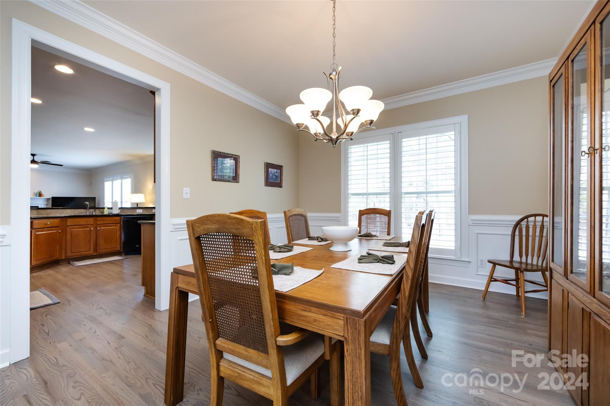 1820 Chestnut Hill Drive Tega Cay, SC 29708 - Photo 10 of 47 a view of a dining room with furniture window and wooden floor
