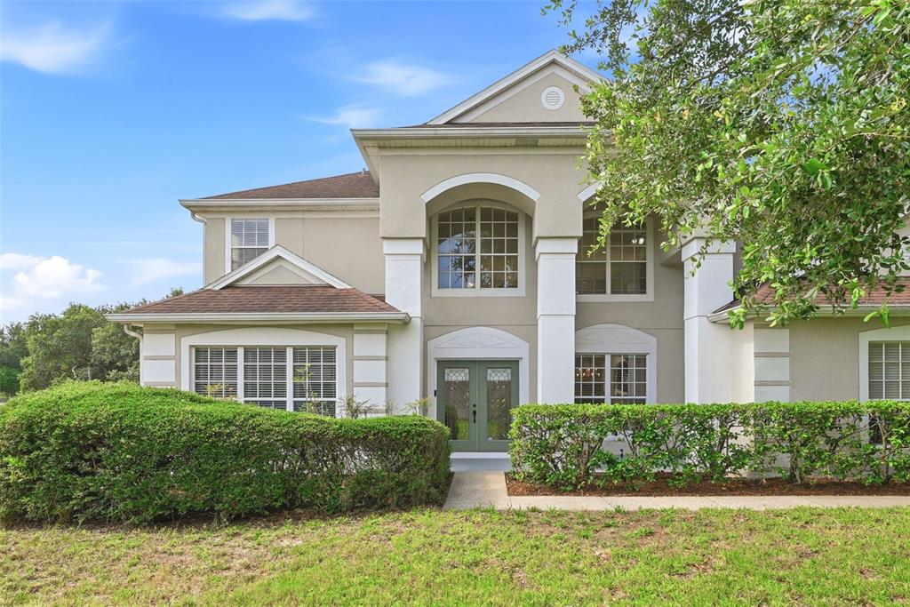936 Kingsridge Circle Gotha, FL 34734 - Photo 34 of 50 a front view of a house with a yard