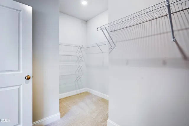 a spacious bathroom with a bathtub and a shower