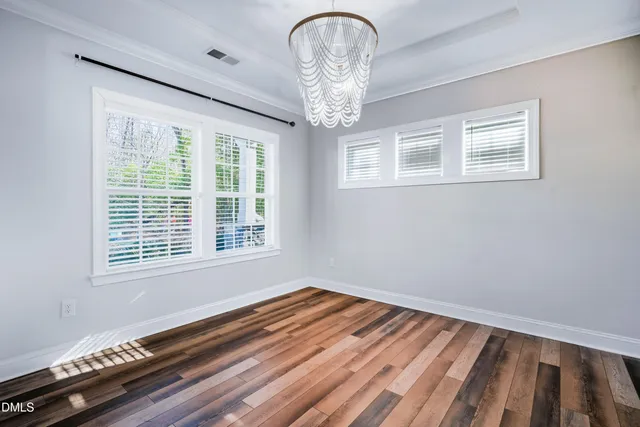 a kitchen with stainless steel appliances a refrigerator sink and stove