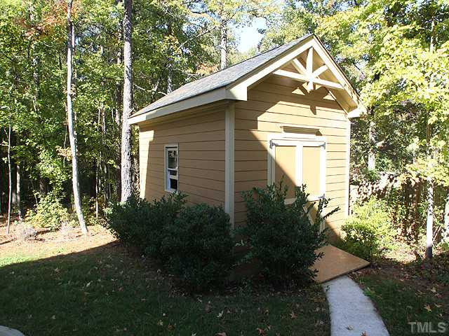 5032 Robinwood Road Durham, NC 27713 - Photo 24 of 25 a front view of a house with a yard