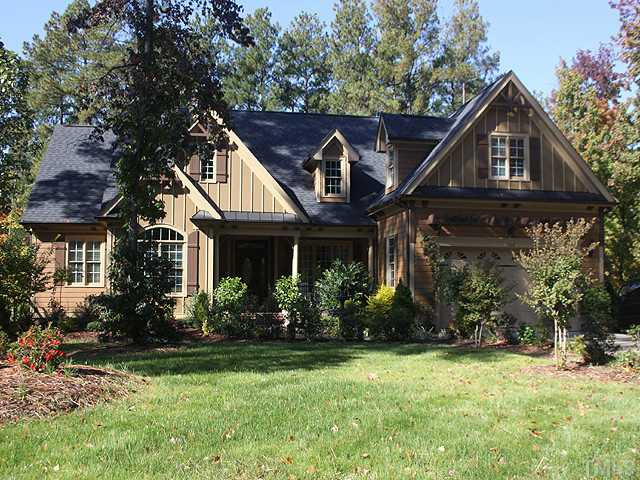 5032 Robinwood Road Durham, NC 27713 - Photo 3 of 25 a front view of a house with garden
