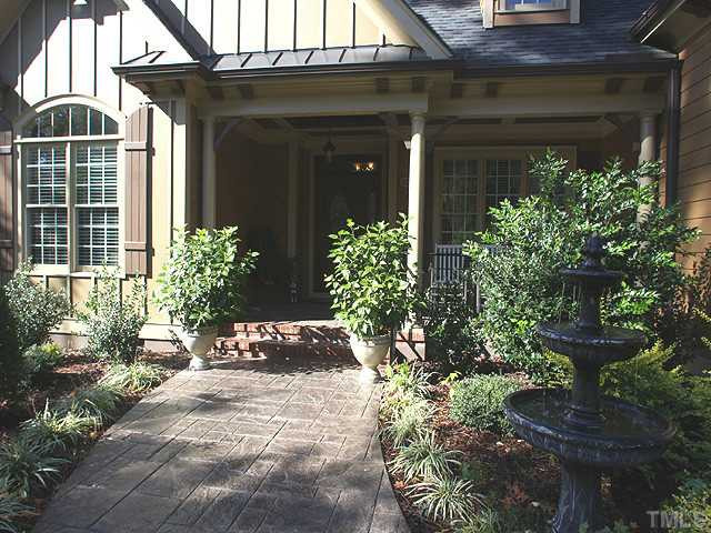 5032 Robinwood Road Durham, NC 27713 - Photo 4 of 25 a front view of a house with a yard