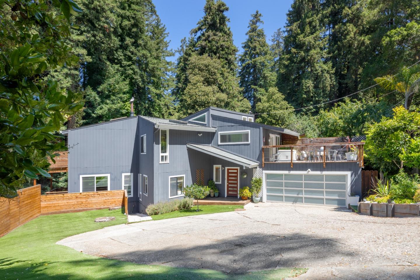 321 Valencia Road Aptos, CA 95003 - Photo 1 of 50 front view of a house with a yard