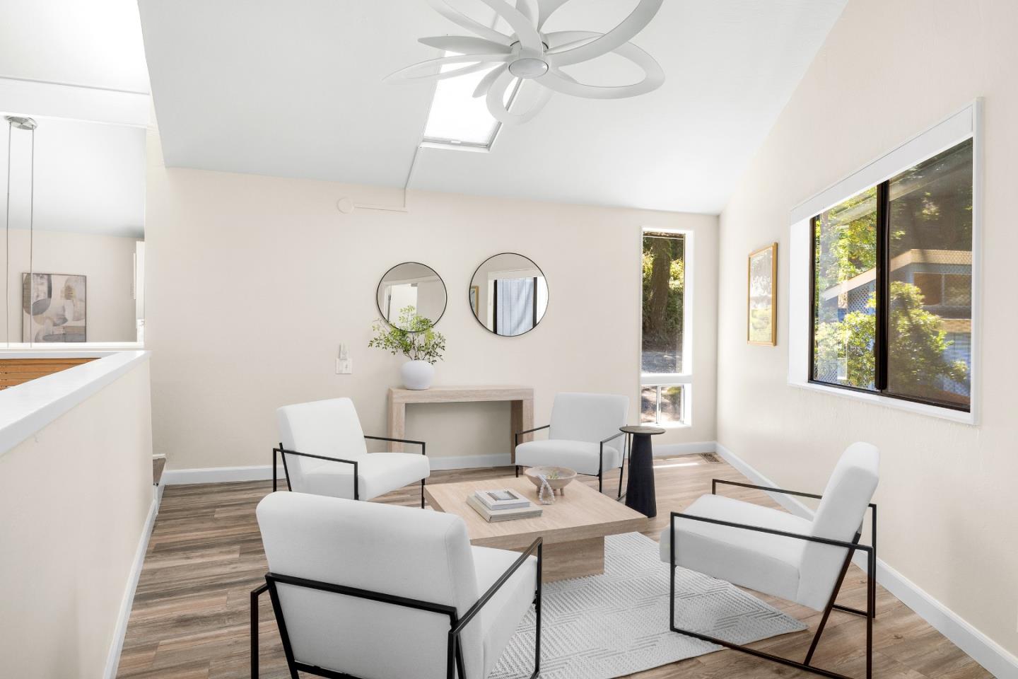 321 Valencia Road Aptos, CA 95003 - Photo 14 of 50 a living room with furniture a window and a table