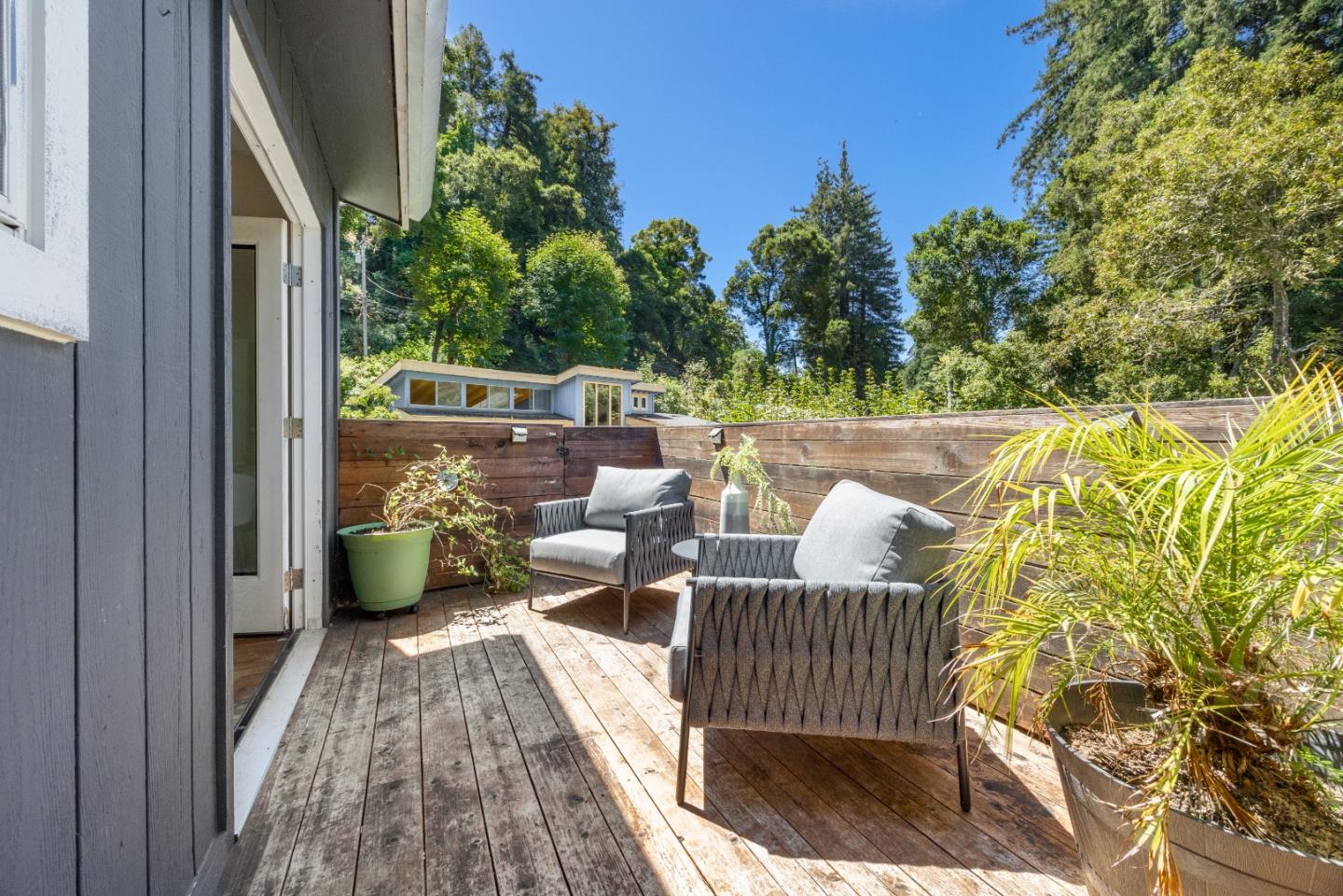 321 Valencia Road Aptos, CA 95003 - Photo 18 of 50 a view of balcony with two chairs and a potted plant