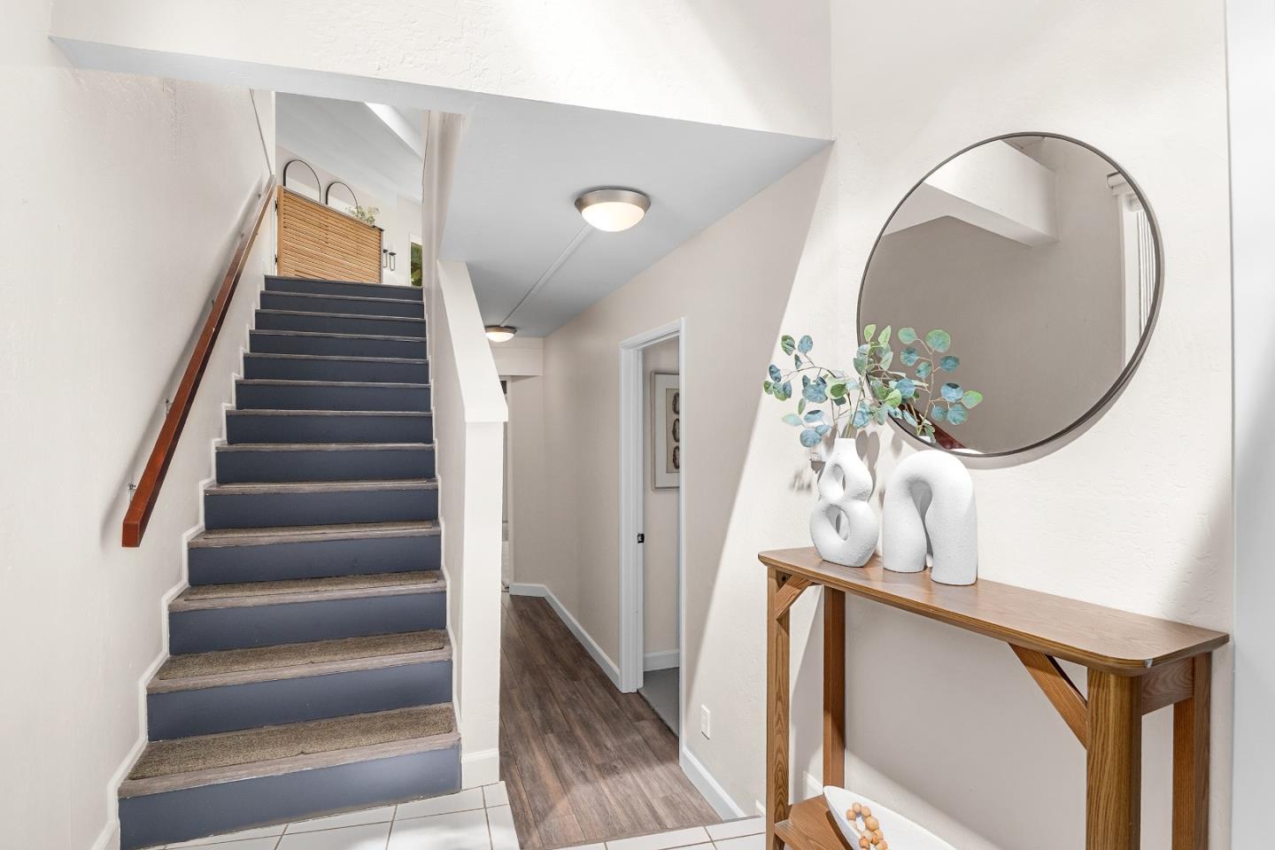 321 Valencia Road Aptos, CA 95003 - Photo 21 of 50 a view of entryway and hall with wooden floor