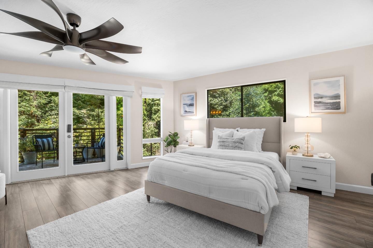 321 Valencia Road Aptos, CA 95003 - Photo 22 of 50 a spacious bedroom with a large bed and a large window