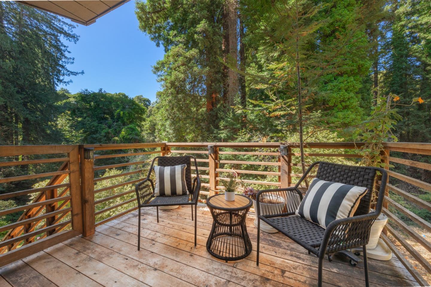 321 Valencia Road Aptos, CA 95003 - Photo 23 of 50 a view of a chairs and table on the deck