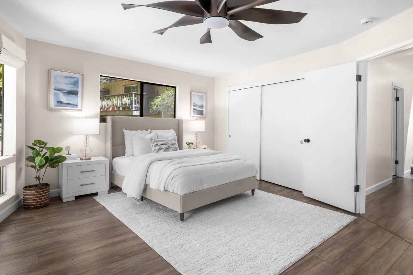 321 Valencia Road Aptos, CA 95003 - Photo 24 of 50 a bedroom with a large bed and windows