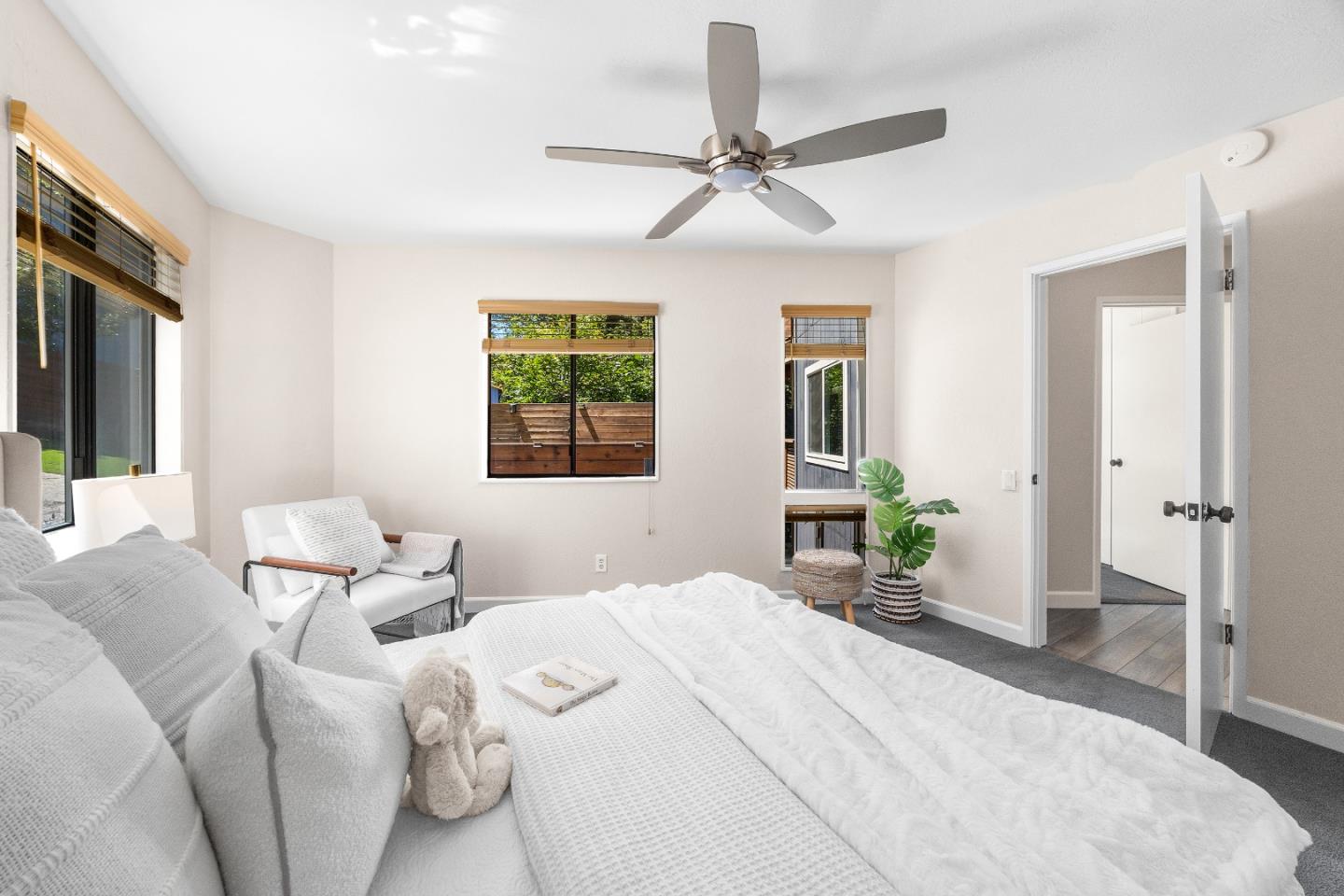 321 Valencia Road Aptos, CA 95003 - Photo 30 of 50 a bedroom with a bed large mirror and furniture