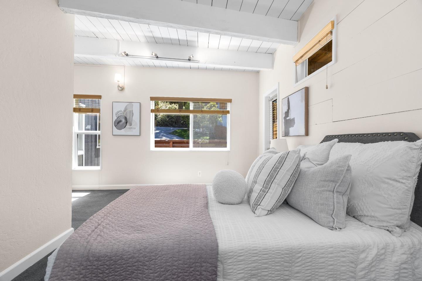 321 Valencia Road Aptos, CA 95003 - Photo 37 of 50 a bedroom with a bed and a window