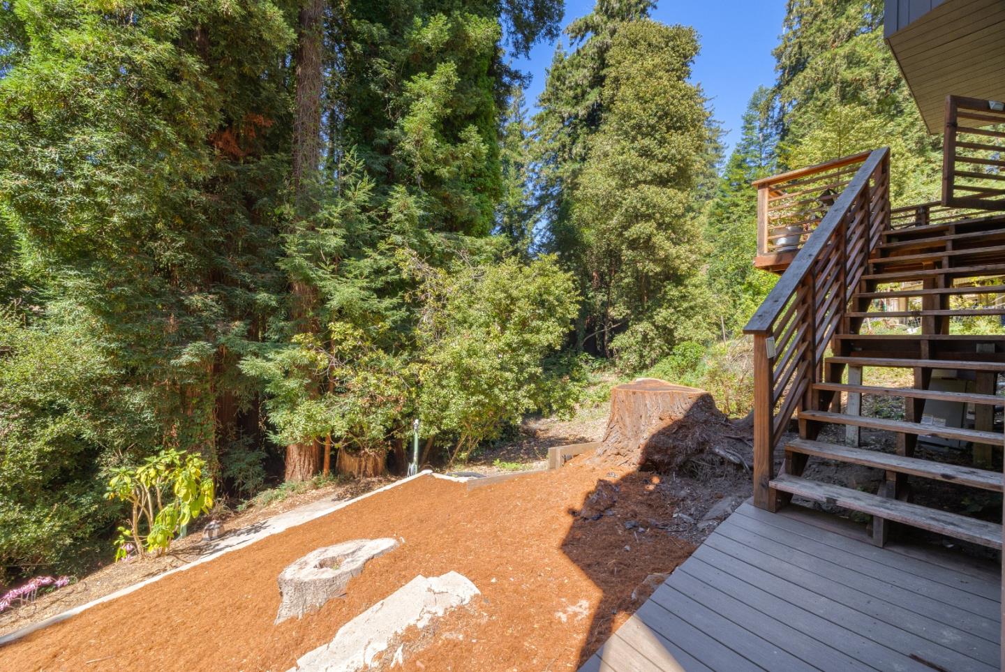321 Valencia Road Aptos, CA 95003 - Photo 45 of 50 a view of a chairs setting on the deck in front of house