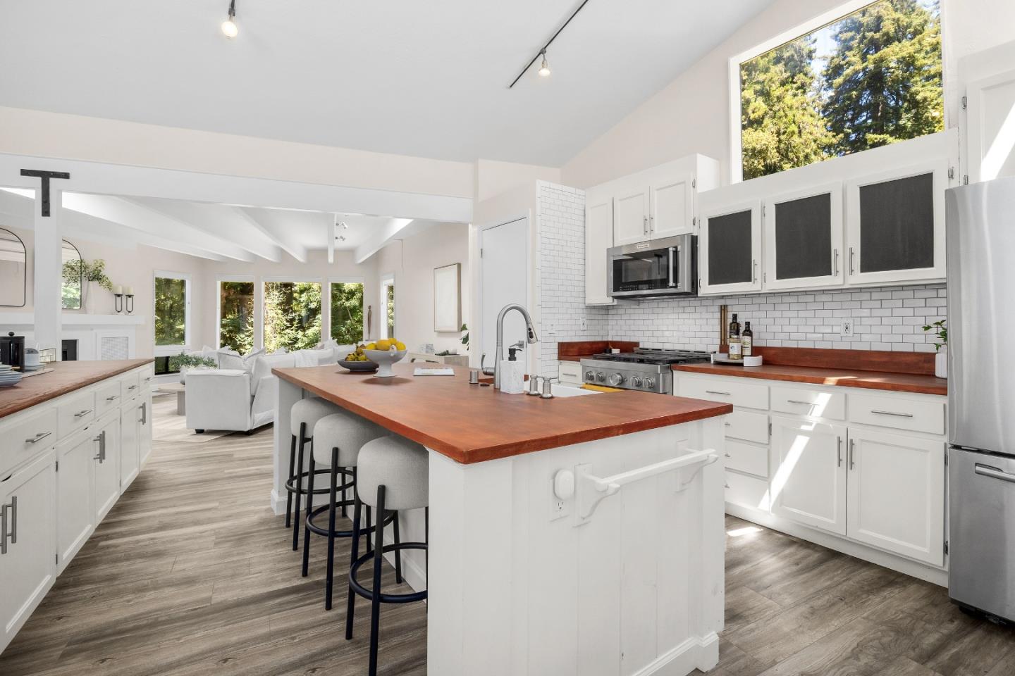 321 Valencia Road Aptos, CA 95003 - Photo 6 of 50 a kitchen with stainless steel appliances a sink stove and cabinets