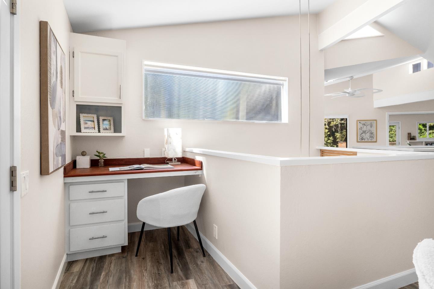 321 Valencia Road Aptos, CA 95003 - Photo 10 of 50 a room with a chair and a window