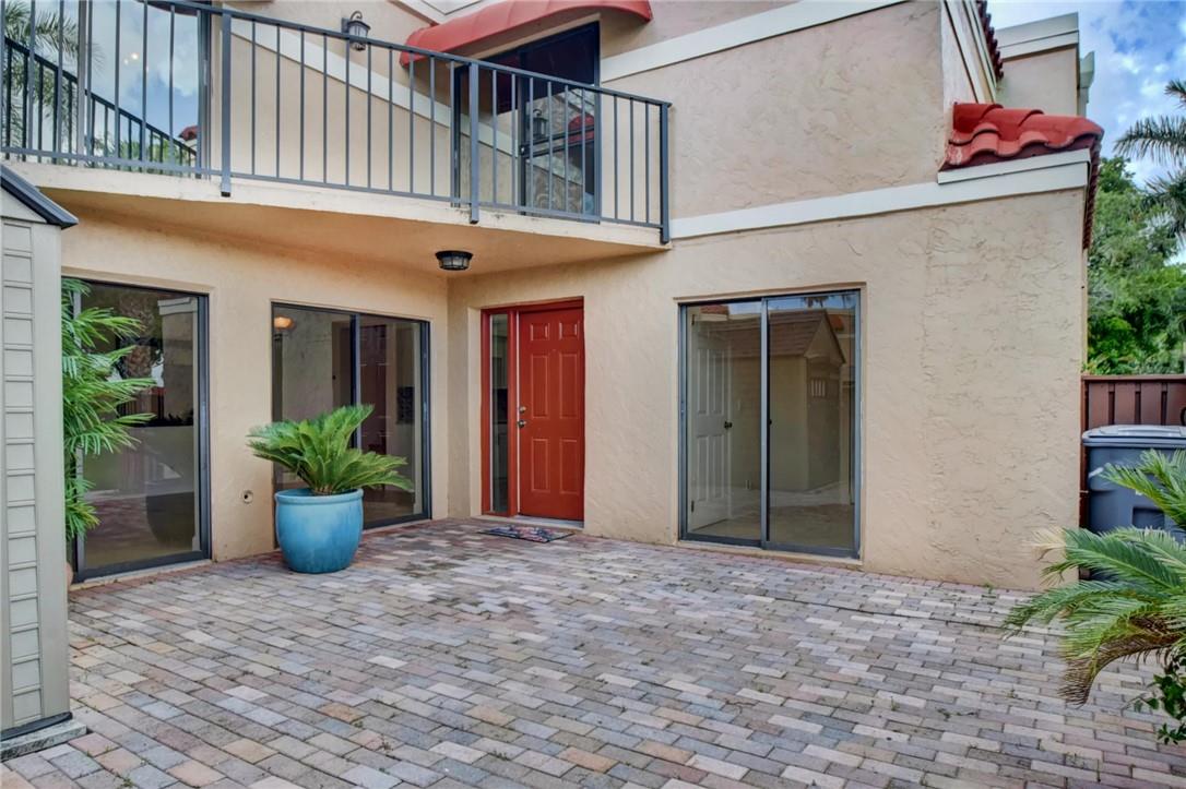 8249 Thames Boulevard, Unit A Boca Raton, FL 33433 - Photo 3 of 29 Brick Patio Entrance