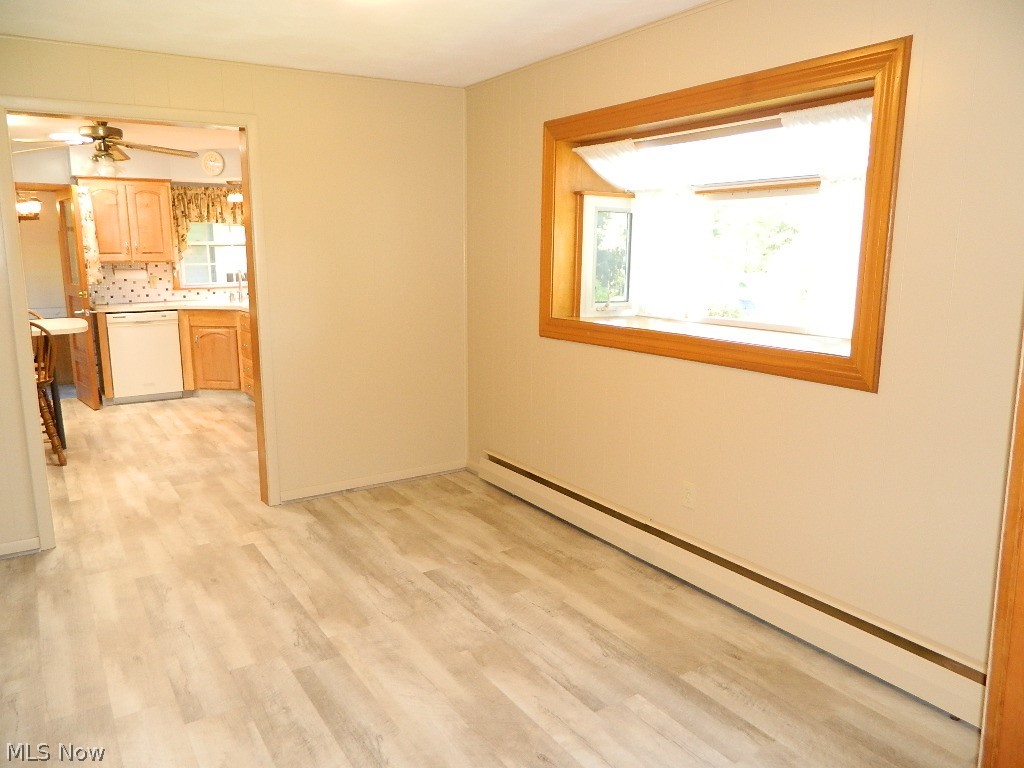 8199 Cedar Road Chesterland, OH 44026 - Photo 7 of 27 Formal Dining Room with Garden Window - Note Newer Vinyl Plank Flooring Here Too!