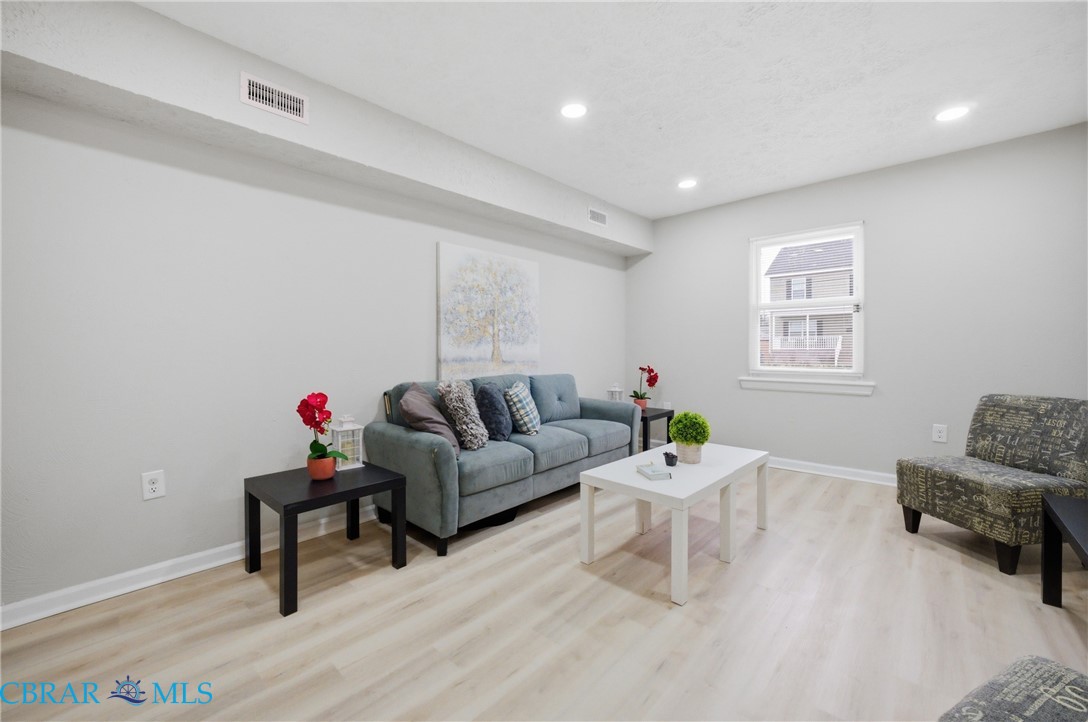 733 Spruce Street Hampton, VA 23661 - Photo 4 of 29 Living room featuring light wood finished floors and recessed lighting