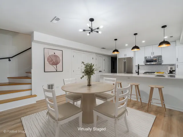 a view of a dining room with furniture
