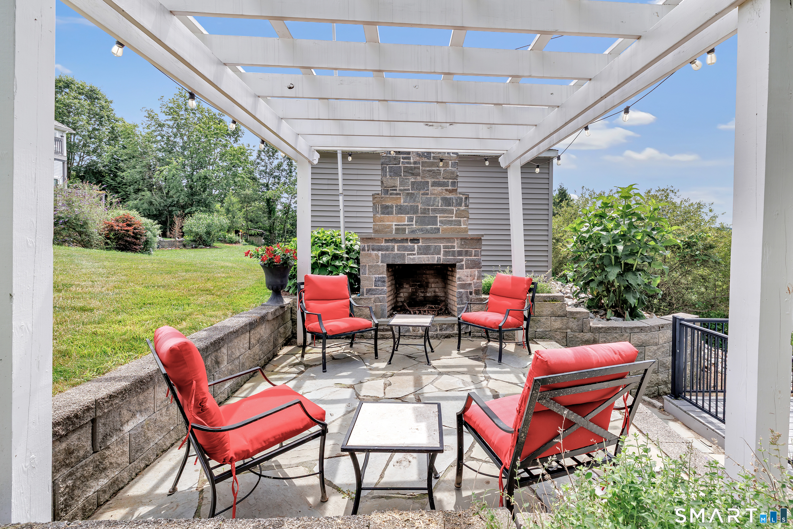 70 North Benham Road Seymour, CT 06483 - Photo 4 of 32 a backyard of a house with outdoor seating
