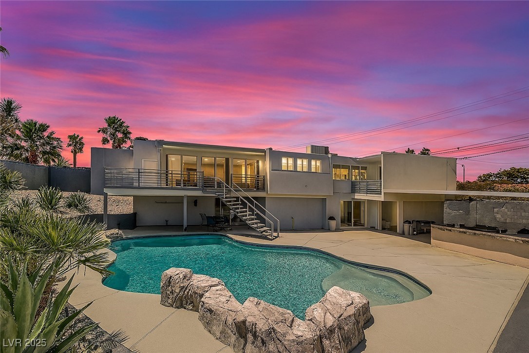2520 Castlesands Way Las Vegas, NV 89121 - Photo 1 of 59 View of pool featuring stairway and a patio