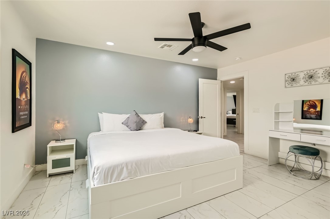 2520 Castlesands Way Las Vegas, NV 89121 - Photo 41 of 59 Bedroom featuring light marble finish flooring, recessed lighting, and ceiling fan