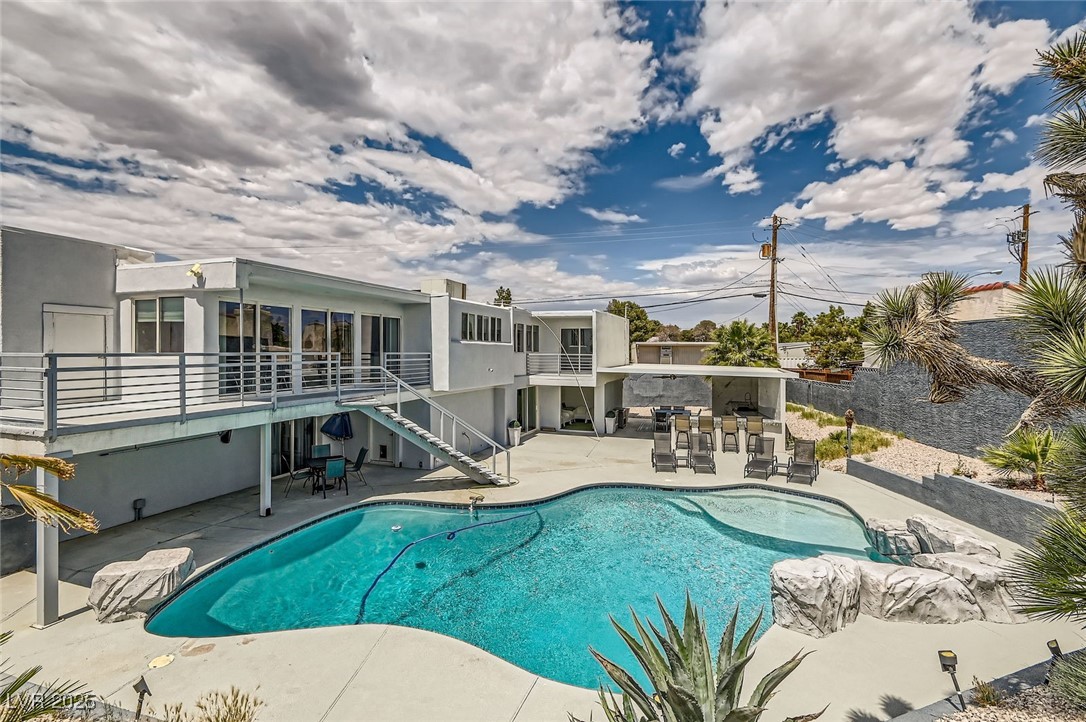 2520 Castlesands Way Las Vegas, NV 89121 - Photo 47 of 59 Outdoor pool featuring a patio and stairway