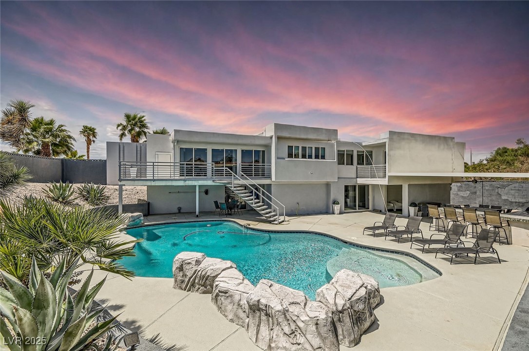2520 Castlesands Way Las Vegas, NV 89121 - Photo 48 of 59 View of swimming pool with stairway and a patio area