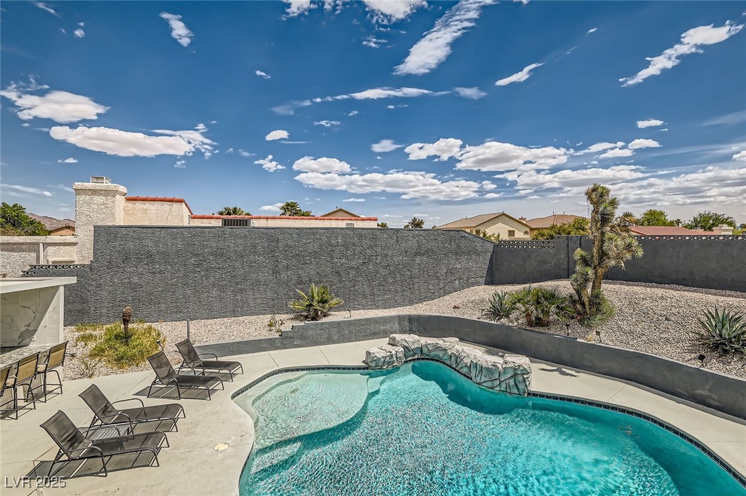 2520 Castlesands Way Las Vegas, NV 89121 - Photo 49 of 59 View of pool featuring a fenced backyard and a patio area