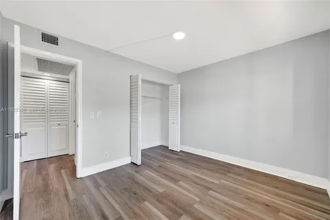 a bathroom with a toilet sink and tub