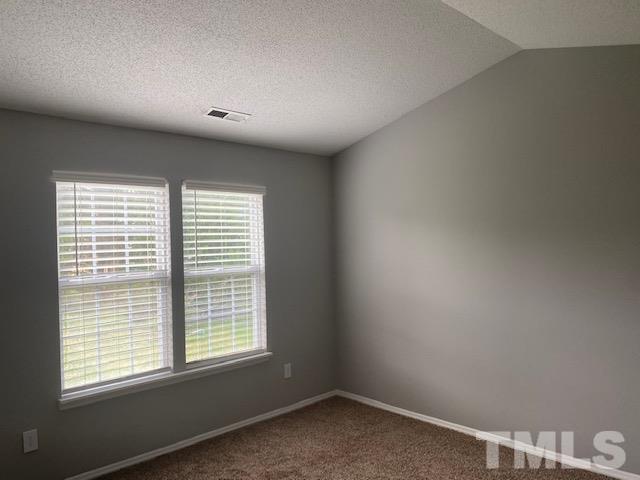 4405 Jordan Oaks Way Raleigh, NC 27604 - Photo 12 of 20 a view of an empty room with a window