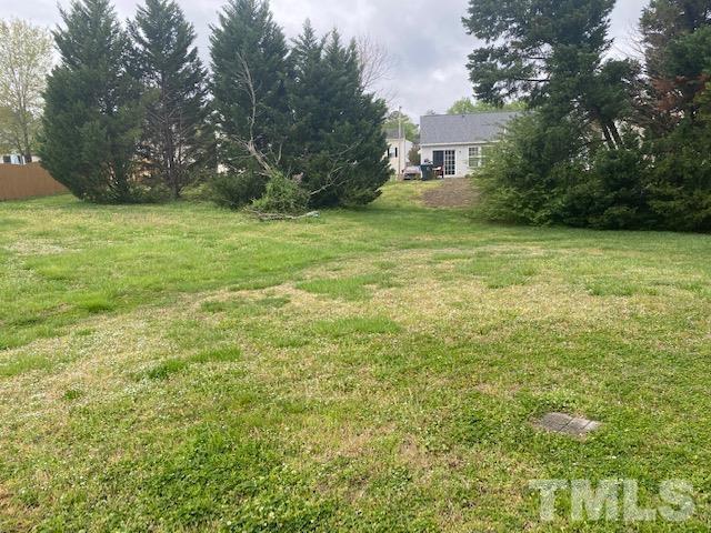 4405 Jordan Oaks Way Raleigh, NC 27604 - Photo 20 of 20 a view of a big yard with plants and large trees