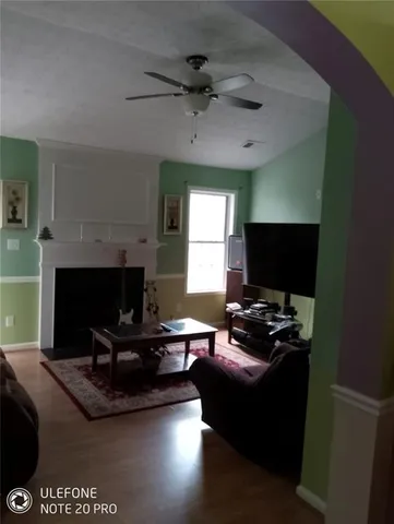 a view of workspace with furniture and window