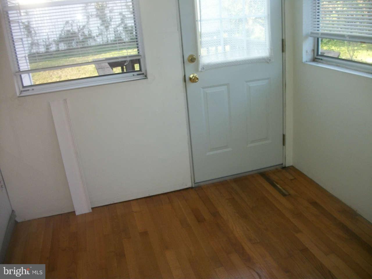 1502 Moffet Road Silver Spring, MD 20903 - Photo 16 of 22 Sunroom 1