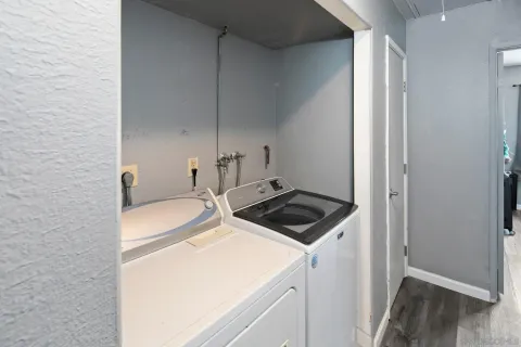 a utility room with dryer and washer