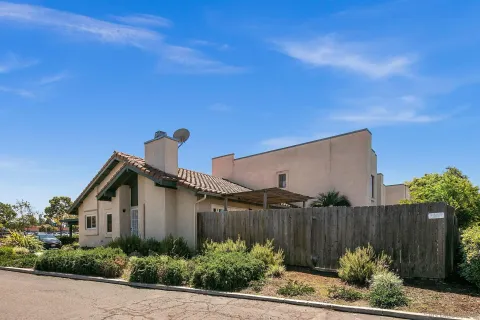 a house view with a garden space