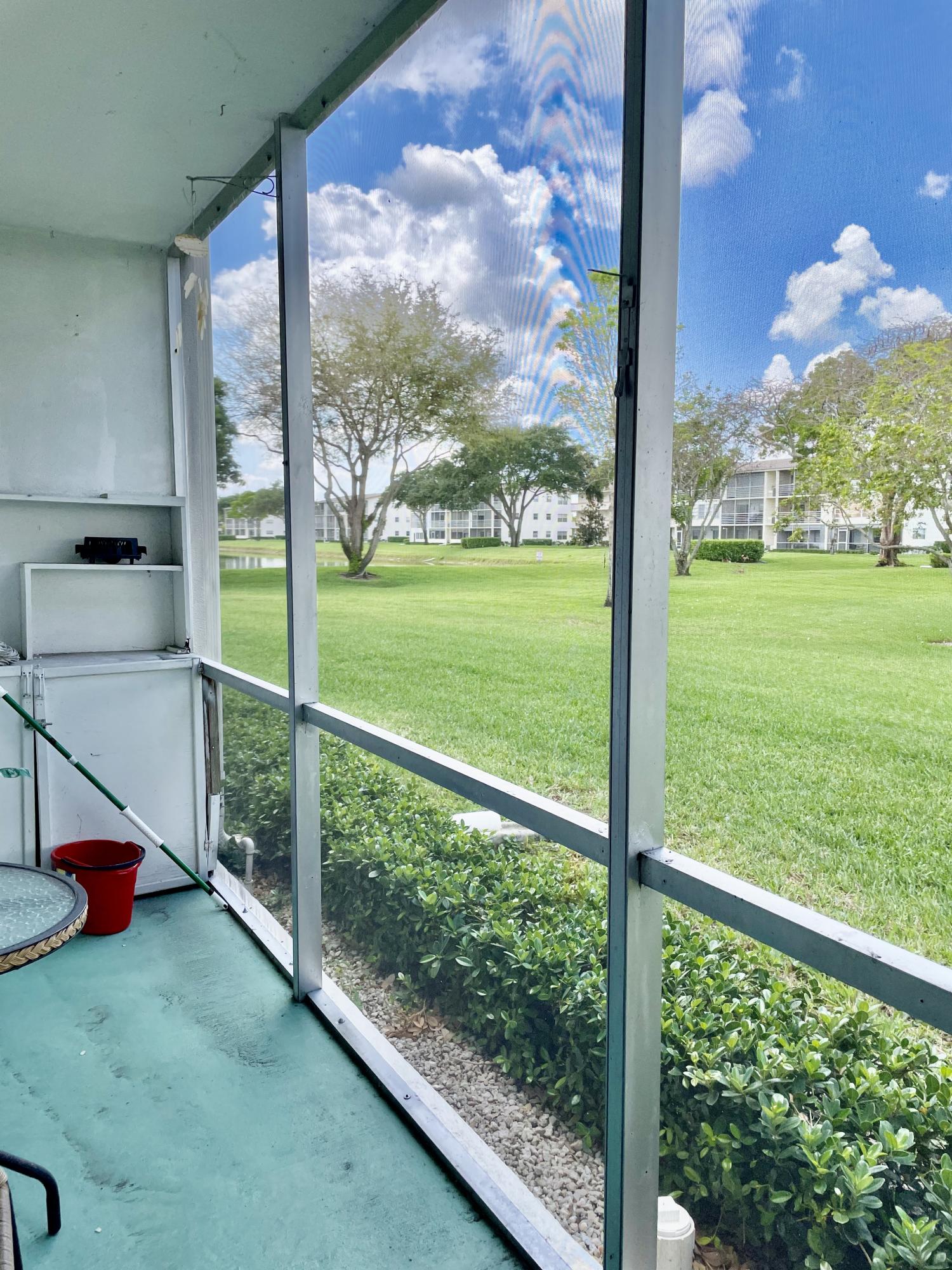 296 Preston H Boca Raton, FL 33434 - Photo 16 of 21 a view of outdoor space and garden