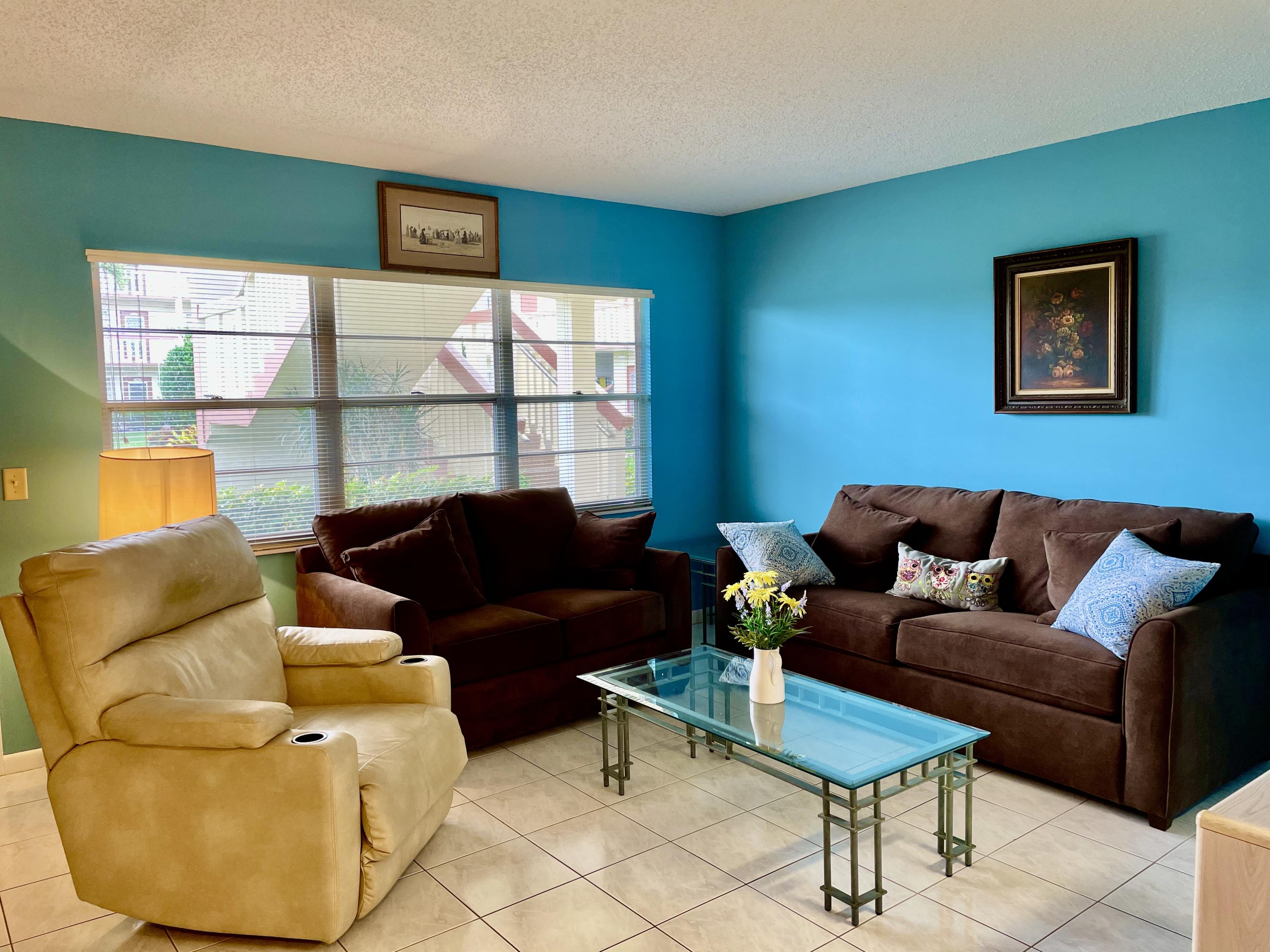 296 Preston H Boca Raton, FL 33434 - Photo 6 of 21 a living room with furniture and a window