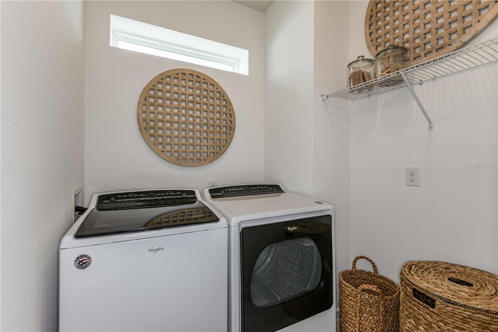2362 Daisy Tree Road St. Cloud, FL 34771 - Photo 27 of 31 a utility room with dryer and washer