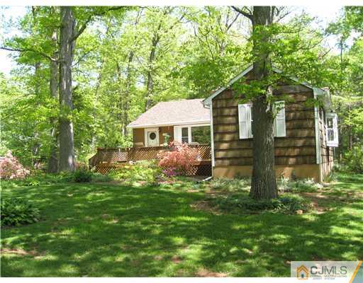 125 Clyde Road Somerset, NJ 08873 - Photo 2 of 13 a view of a house with a yard