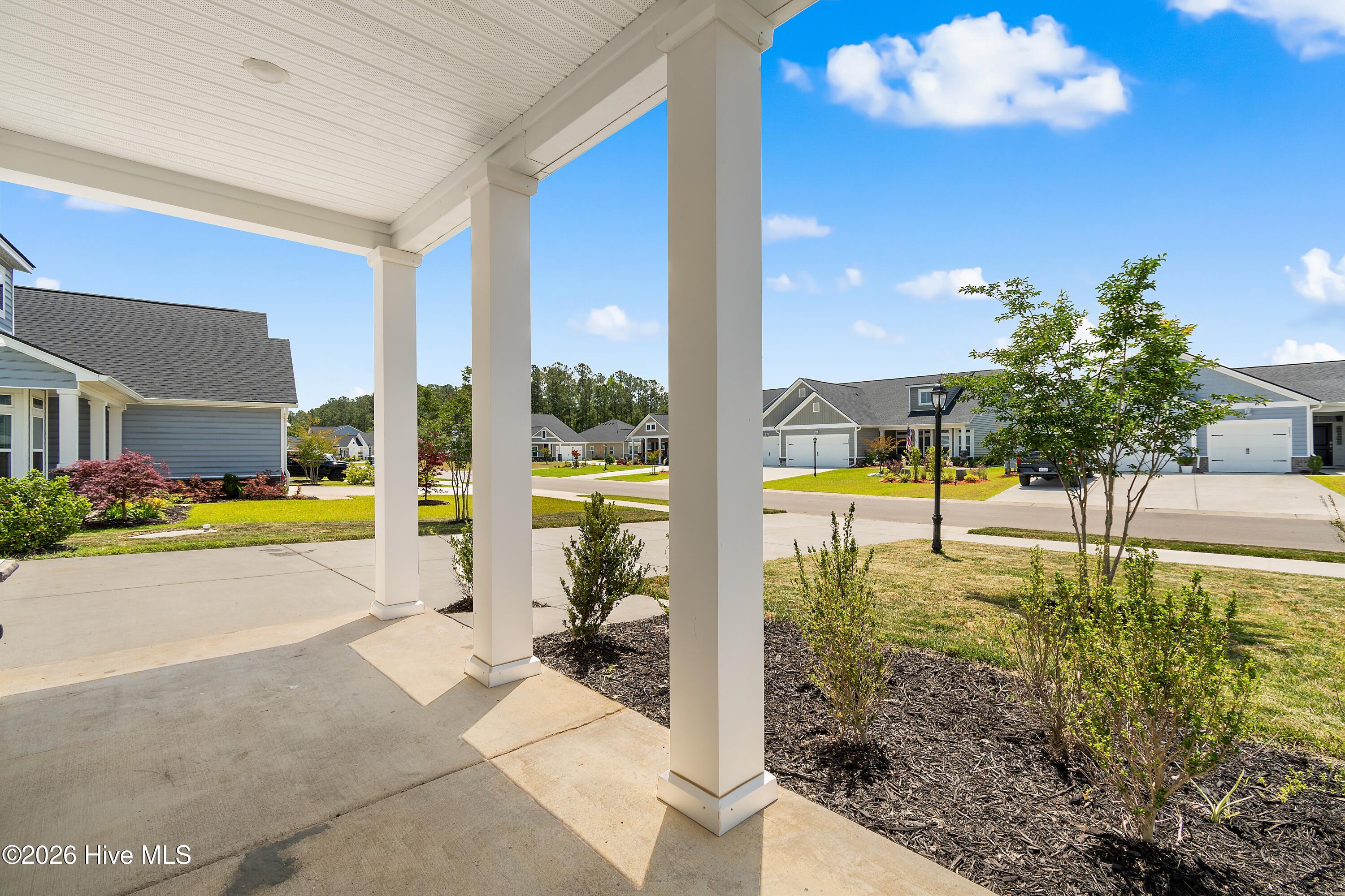 8850 Baton Rouge Avenue Northwest Calabash, NC 28467 - Photo 2 of 58 Front Sitting Porch