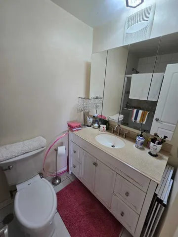 a bathroom with a tub and a shower