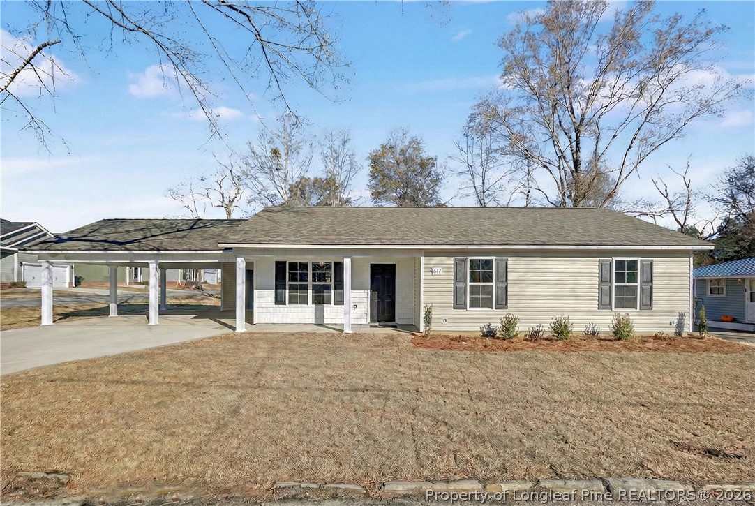 214 Lee Street Spring Lake, NC 28390 - Photo 1 of 44 front view of a house with a yard