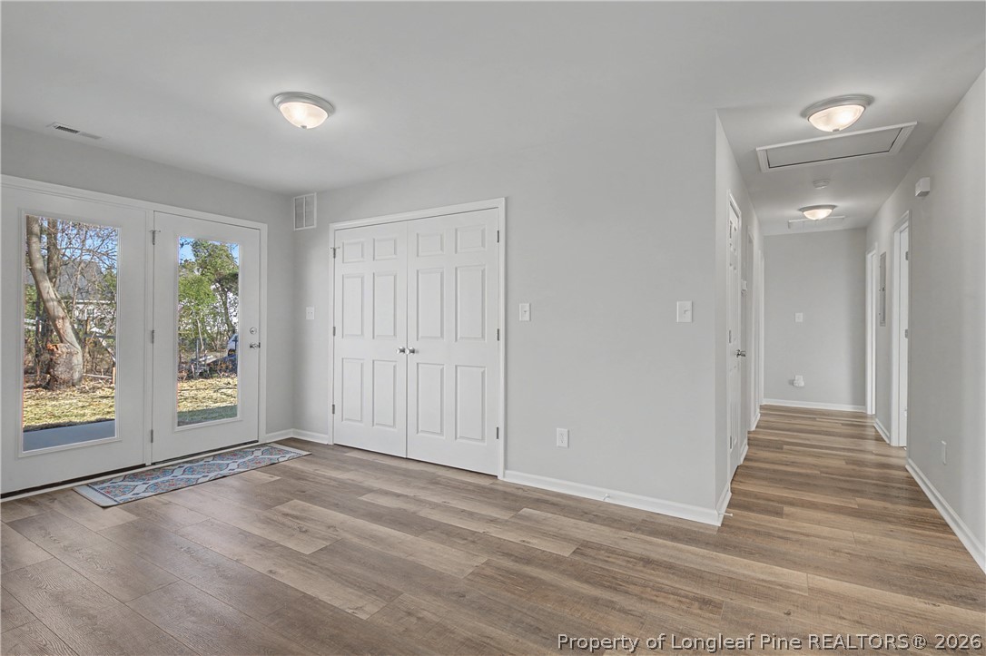 214 Lee Street Spring Lake, NC 28390 - Photo 15 of 44 wooden floor in an empty room with a window