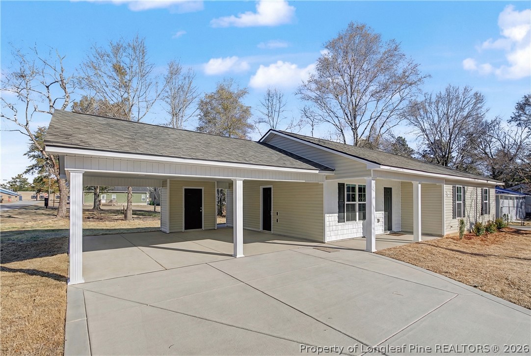 214 Lee Street Spring Lake, NC 28390 - Photo 3 of 44 a view of a house with a outdoor space